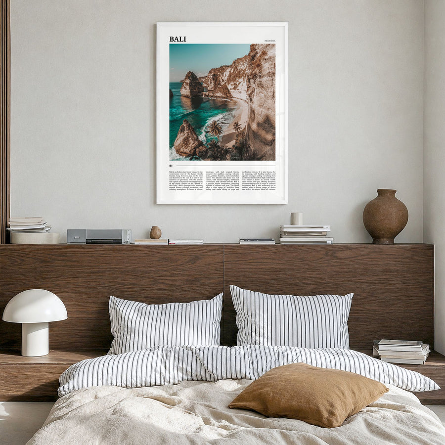 Bali Travel Poster in a white wood frame, hanging in a bedroom