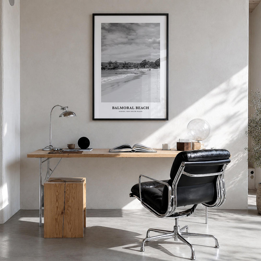 Balmoral Beach black & white classic poster of Australia – vertical wall art in black wood frame, hanging on wall