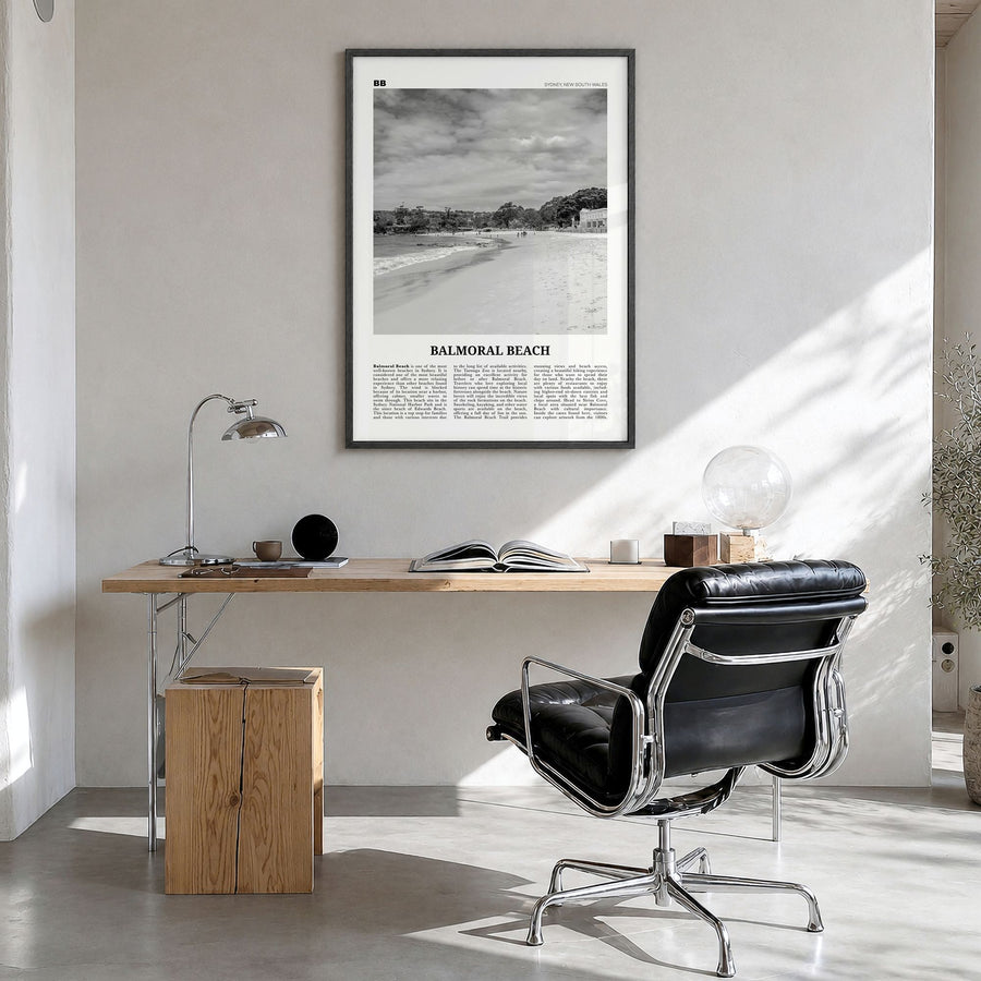 Balmoral Beach Newspaper Poster in a black wood frame, hanging in a bright home office