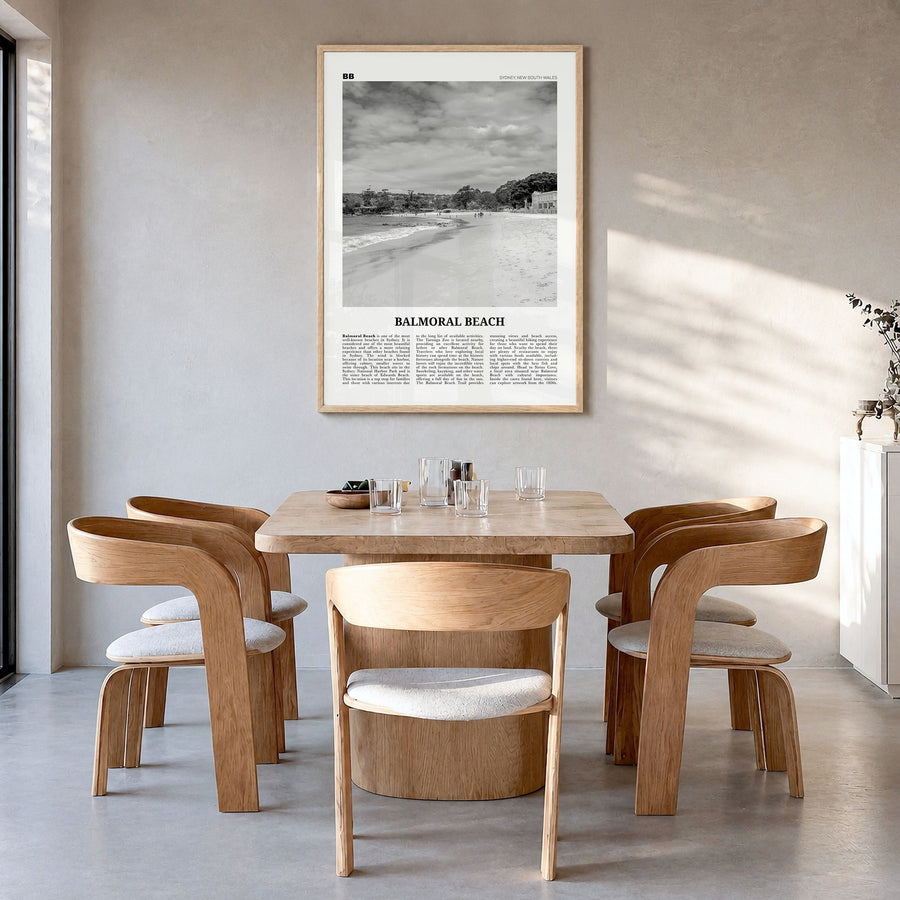 Balmoral Beach Newspaper Poster in a natural wood frame, hanging in a dining room