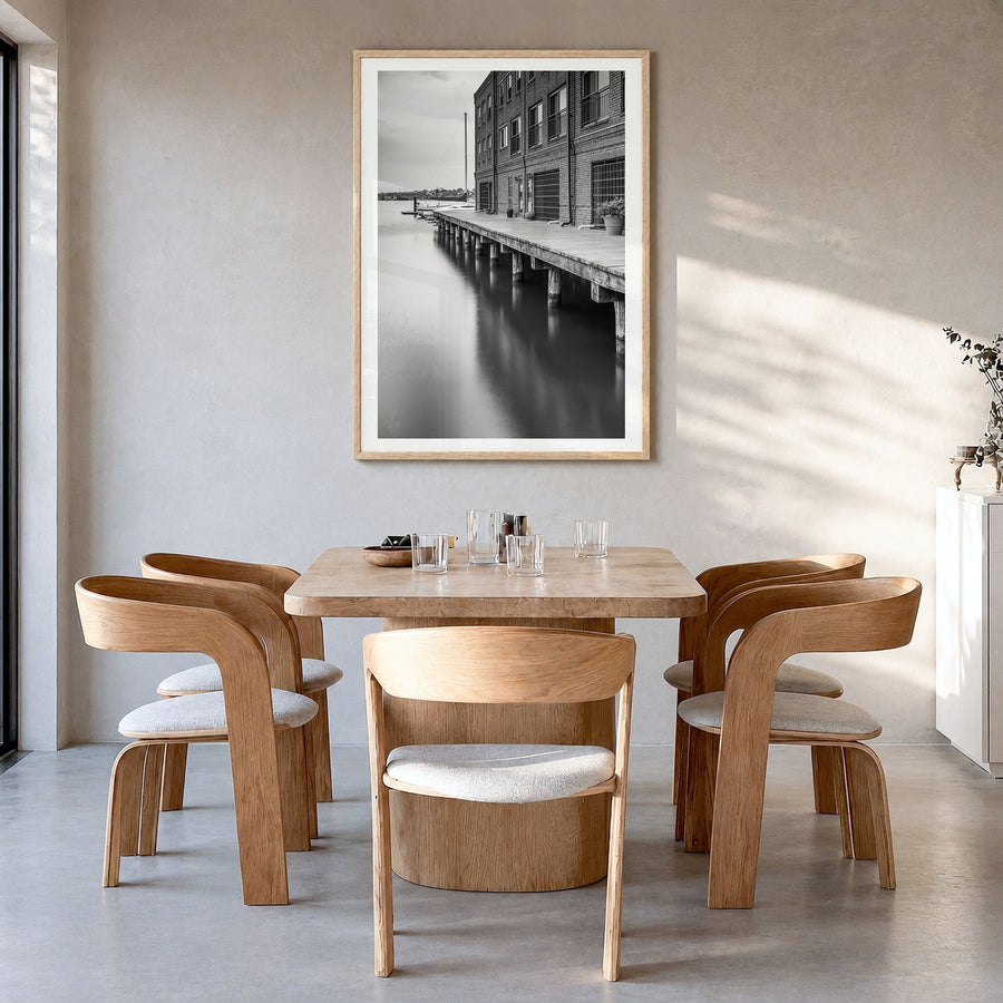 Baltimore Photo No 3 Poster in a natural wood frame, hanging in a dining room, white border
