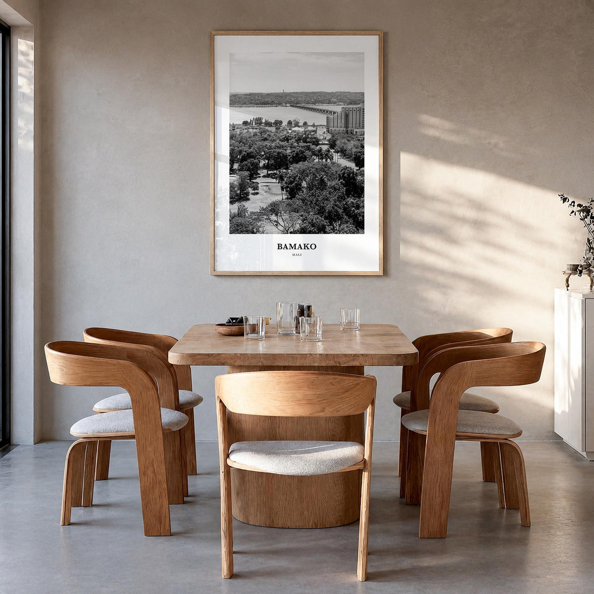 Bamako black & white classic poster of Mali – vertical wall art in natural wood frame, hanging on wall