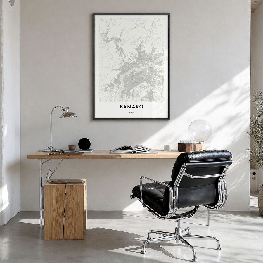 Bamako Map Poster in a black wood frame, hanging in a bright home office