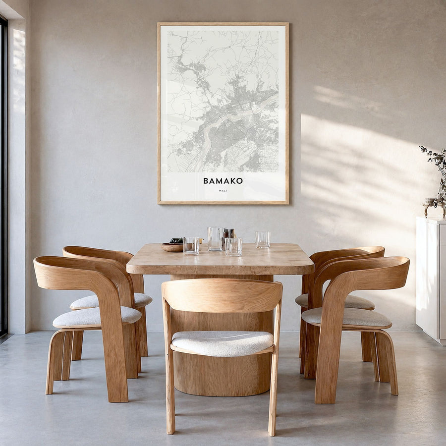 Bamako Map Poster in a natural wood frame, hanging in a dining room