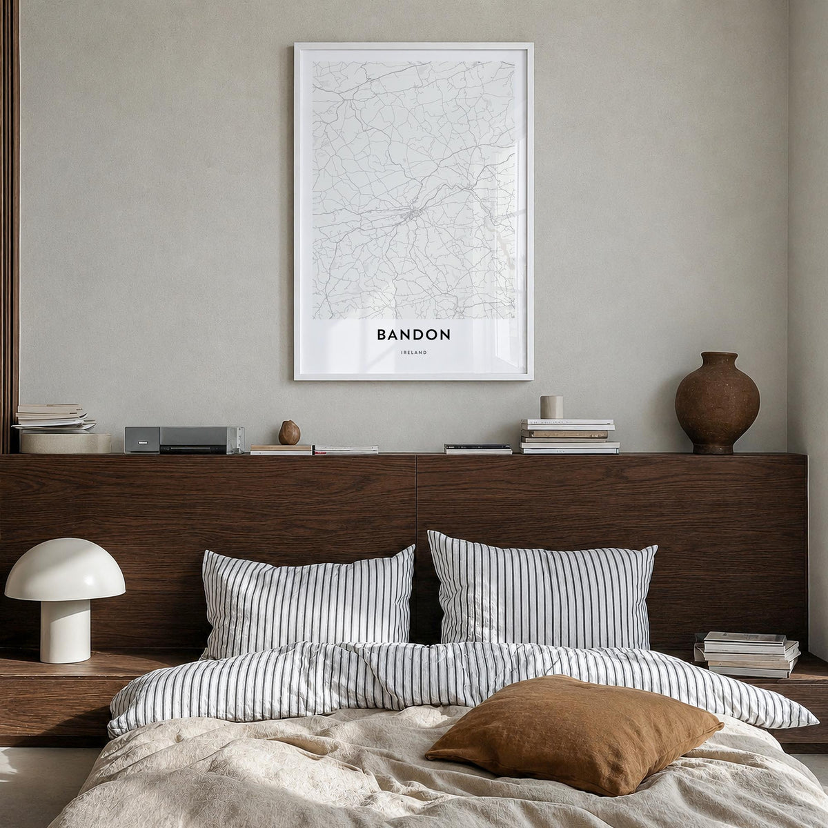 Bandon black & white map poster of Oregon, USA – vertical wall art in white wood frame, hanging on wall
