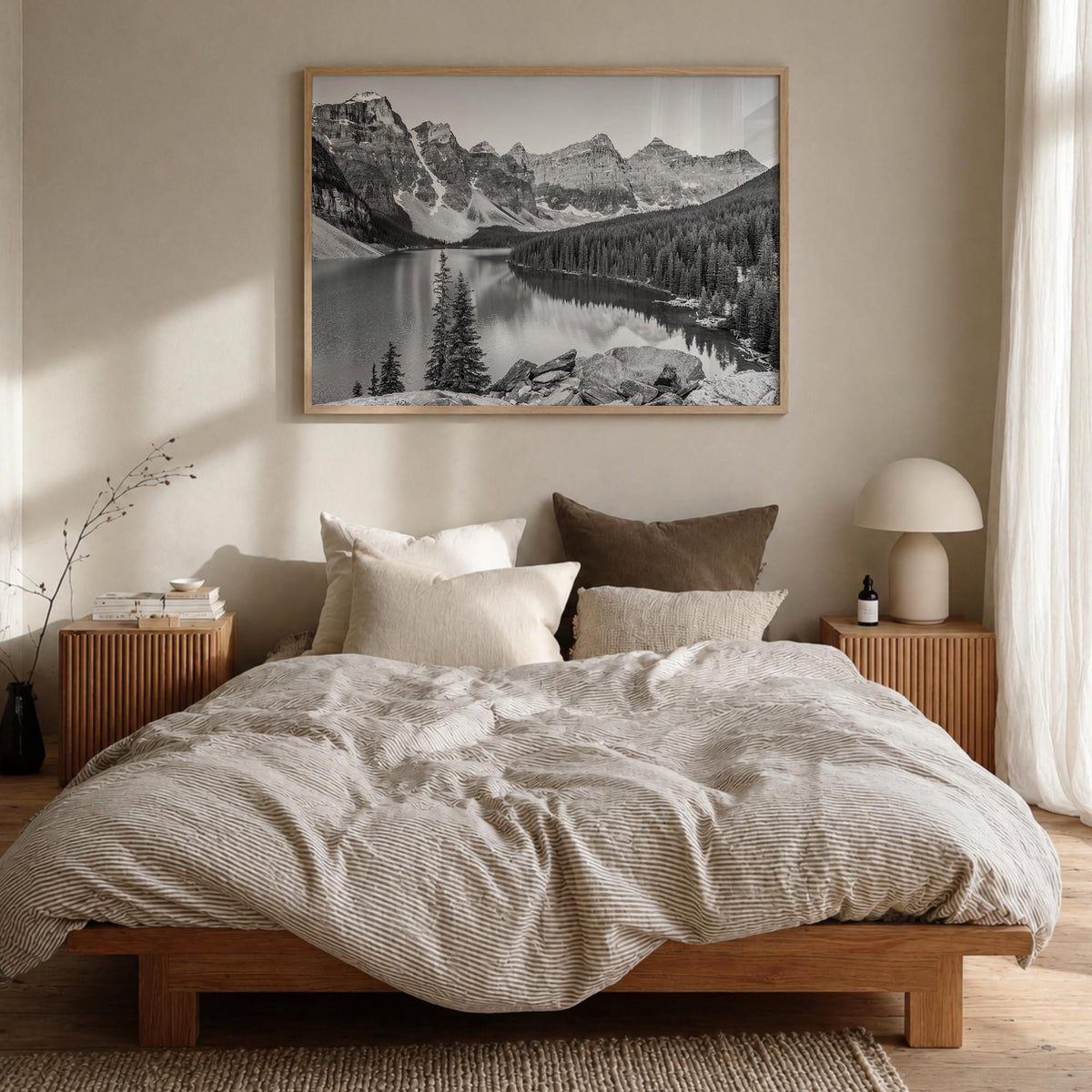 Banff black & white photo poster of Alberta, Canada – horizontal wall art in natural wood frame, hanging on wall