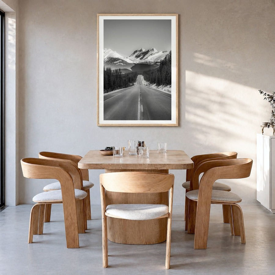 Banff Photo Poster in a natural wood frame, hanging in a dining room, white border
