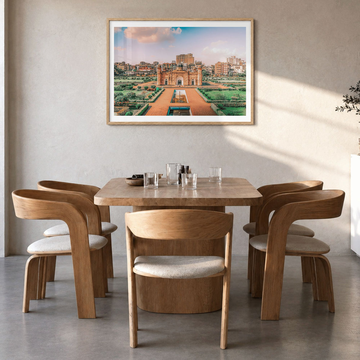 Bangladesh Photo Poster in a natural wood frame, hanging in a dining room, white border