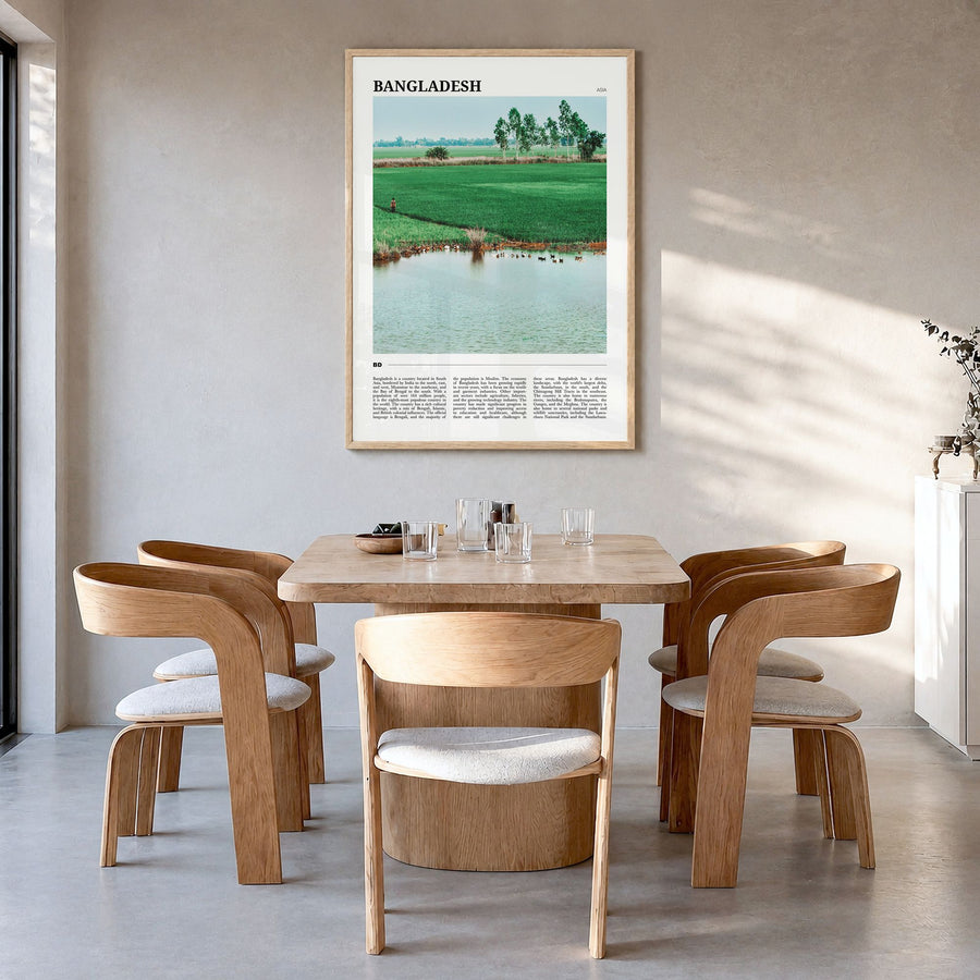 Bangladesh Travel Poster in a natural wood frame, hanging in a dining room