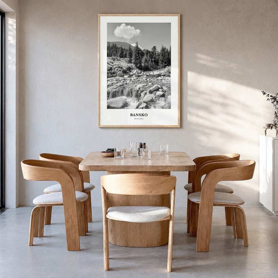Bansko Classic Poster in a natural wood frame, hanging in a dining room