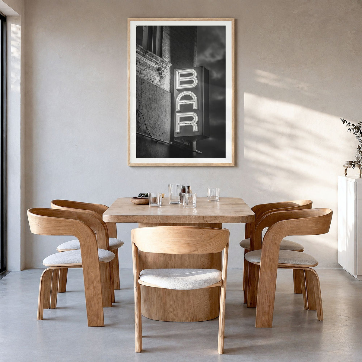 Bar Sign Photo Poster in a natural wood frame, hanging in a dining room, white border