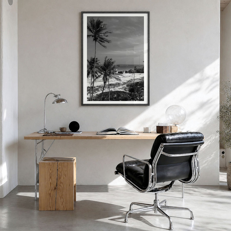 Barbados Photo Poster in a black wood frame, hanging in a bright home office, white border