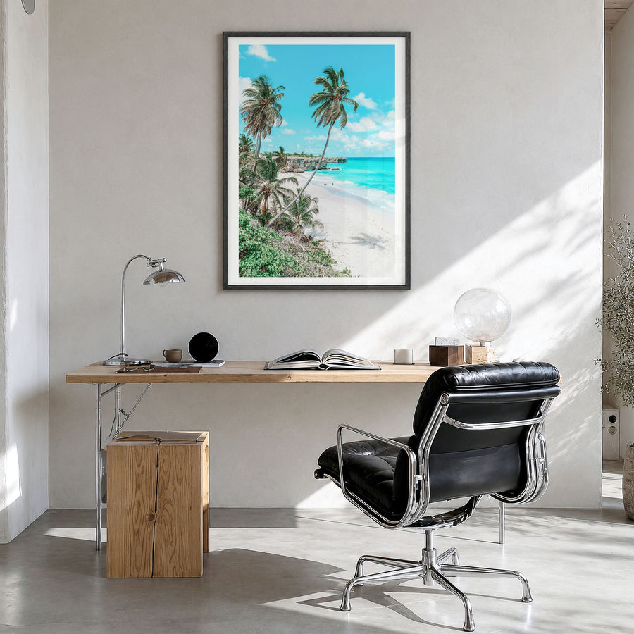 Barbados Photo Poster in a black wood frame, hanging in a bright home office, white border