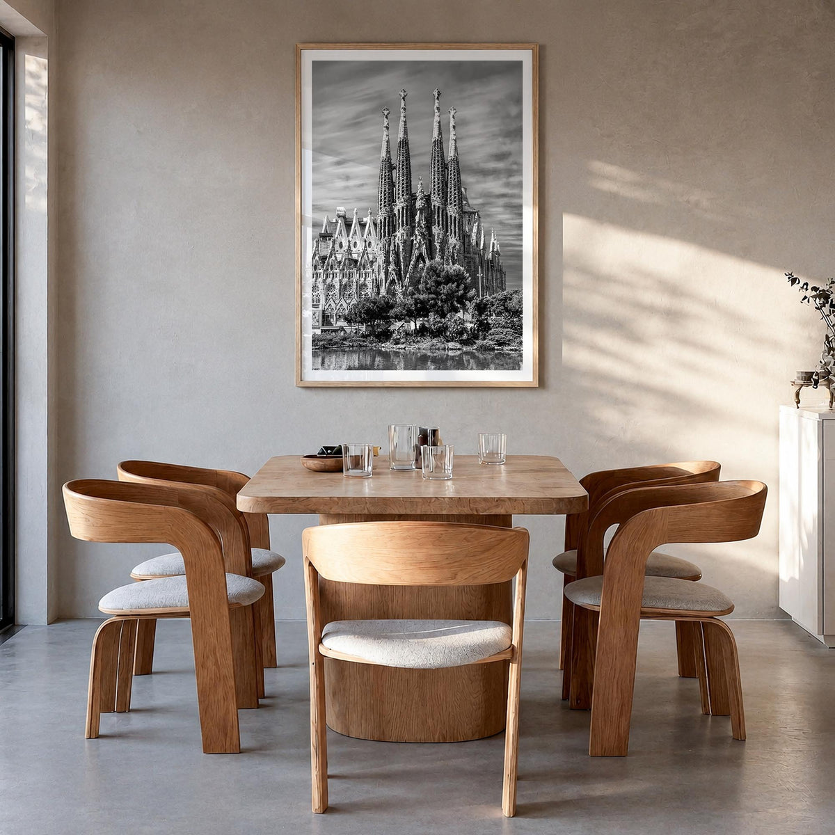 Barcelona no. 2 black & white photo poster of Spain – vertical wall art in natural wood frame with white border, hanging on w