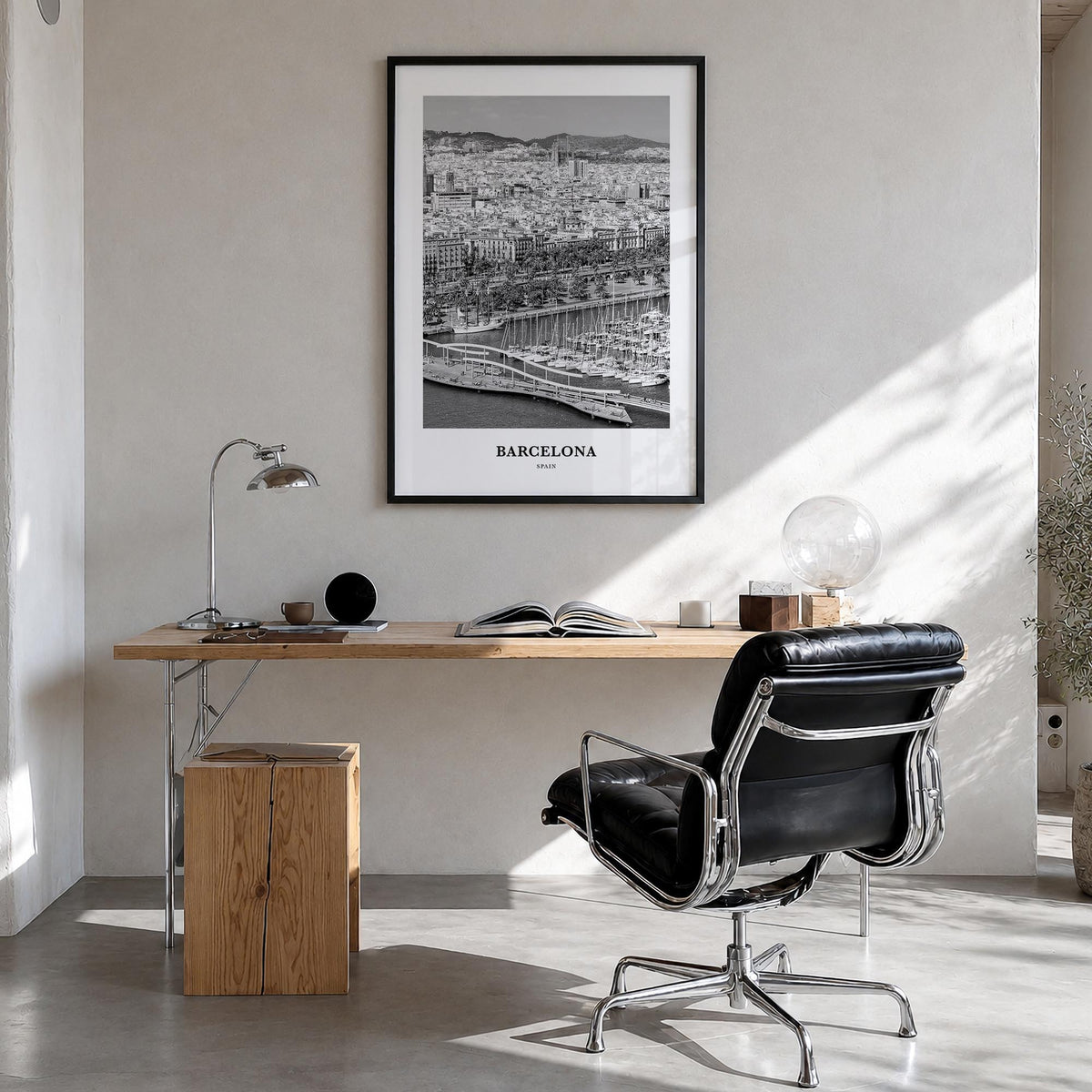 Barcelona no. 3 black & white classic poster of Spain – vertical wall art in black wood frame, hanging on wall