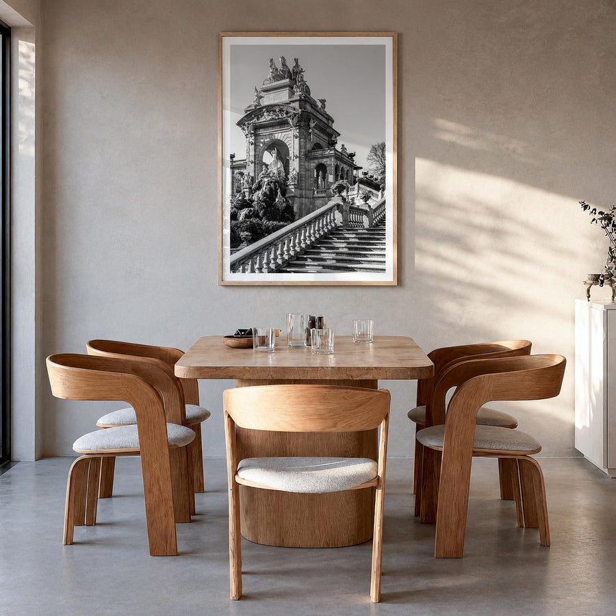 Barcelona no. 3 black & white photo poster of Spain – vertical wall art in natural wood frame with white border, hanging on w