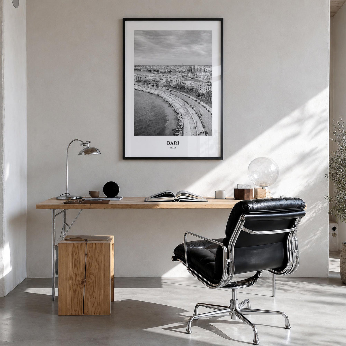 Bari black & white classic poster of Italy – vertical wall art in black wood frame, hanging on wall