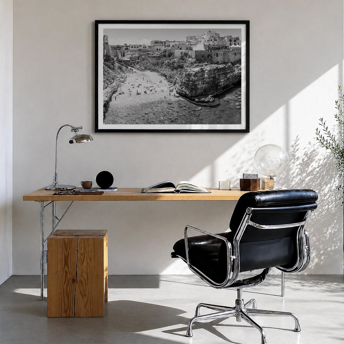Bari black & white photo poster of Italy – horizontal wall art in black wood frame with white border, hanging on wall