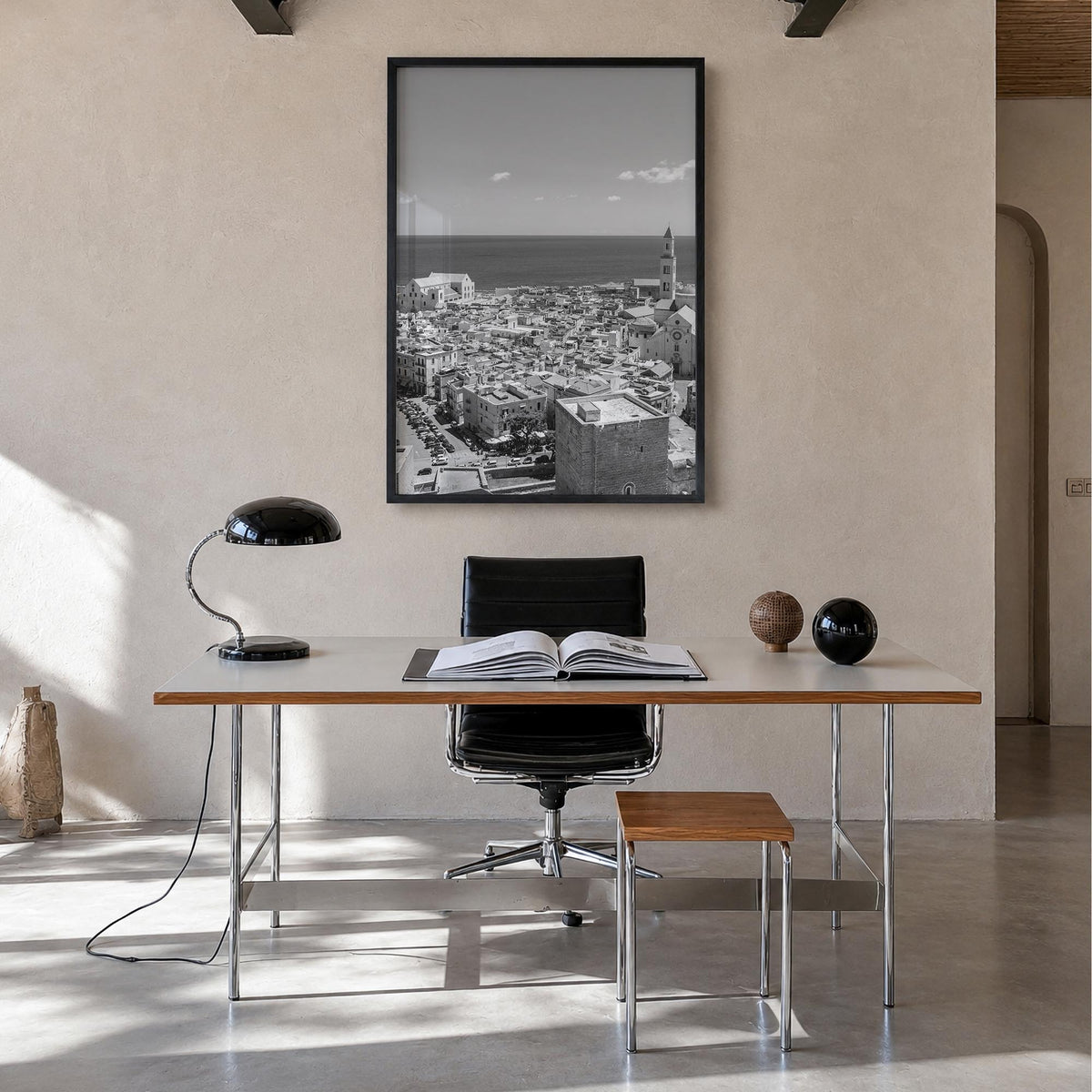 Bari black & white photo poster of Italy – vertical wall art in black wood frame, hanging on wall