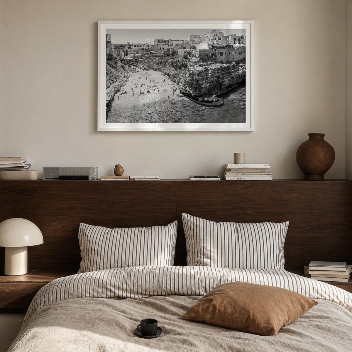 Bari black & white photo poster of Italy – horizontal wall art in white wood frame with white border, hanging on wall
