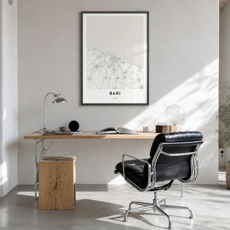 Bari Map Poster in a black wood frame, hanging in a bright home office