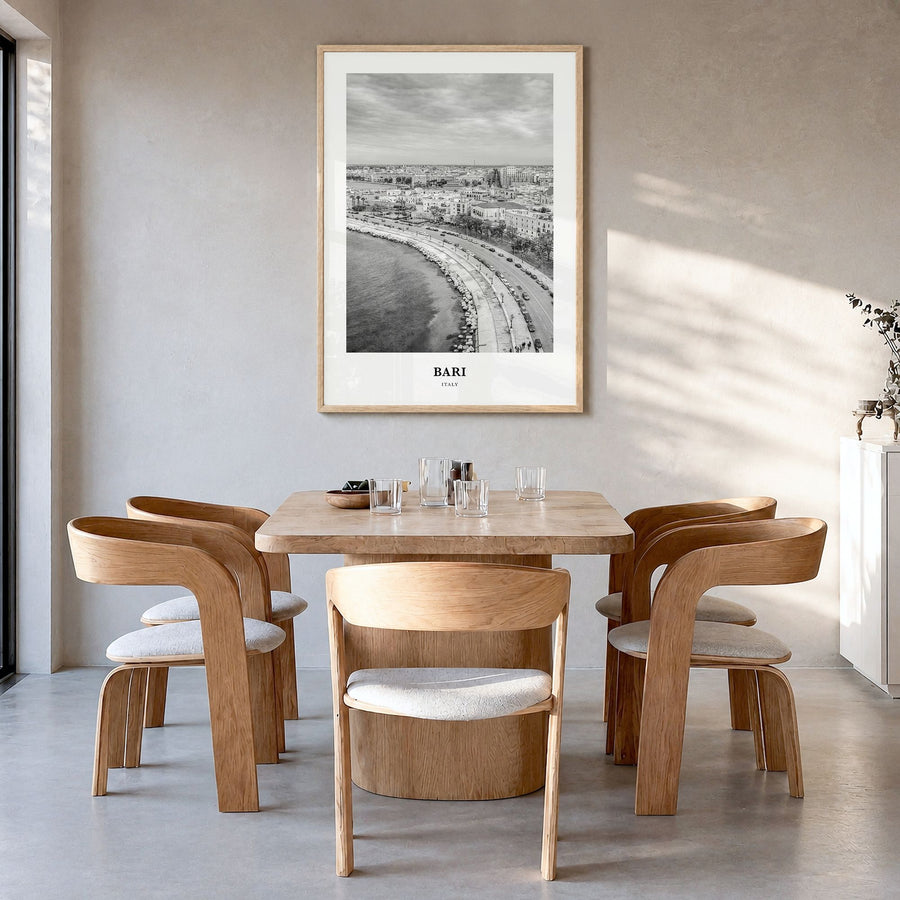 Bari Classic Poster in a natural wood frame, hanging in a dining room