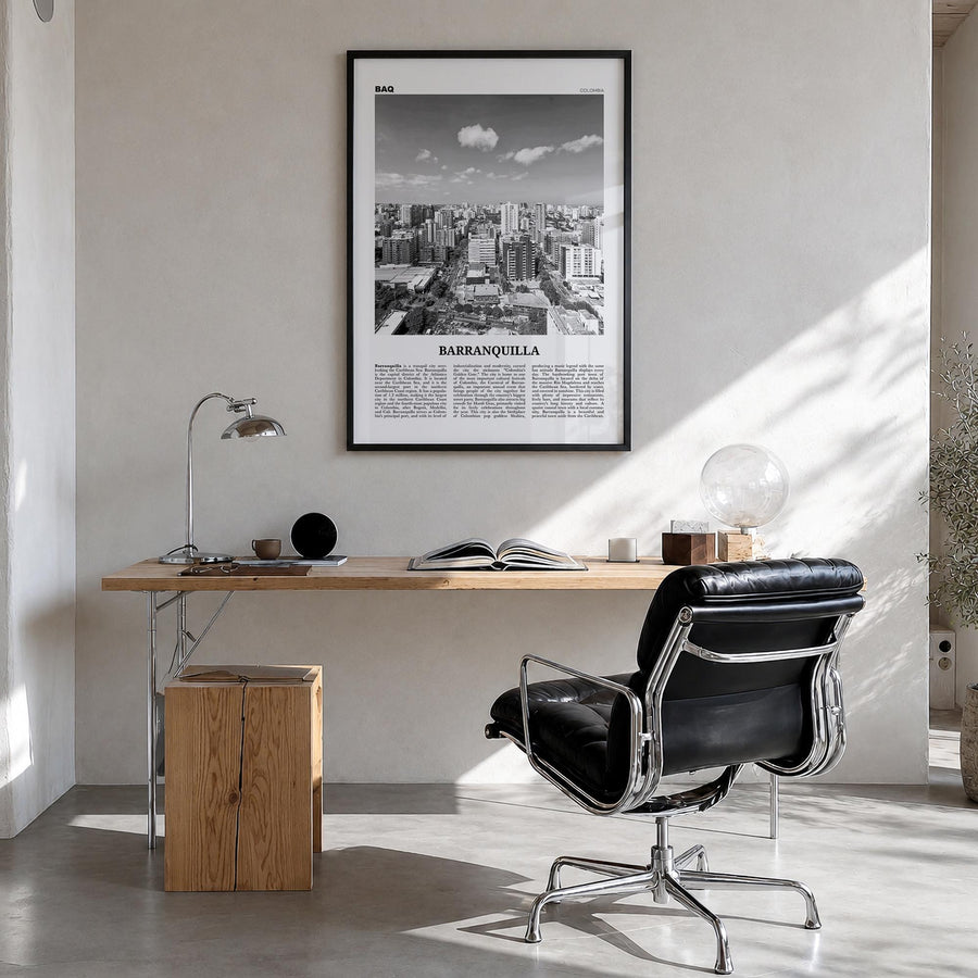 Barranquilla black & white newspaper poster of Colombia – vertical wall art in black wood frame, hanging on wall