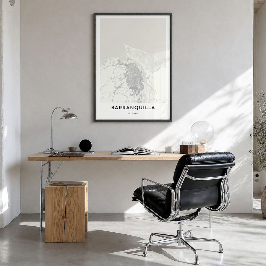 Barranquilla Map Poster in a black wood frame, hanging in a bright home office