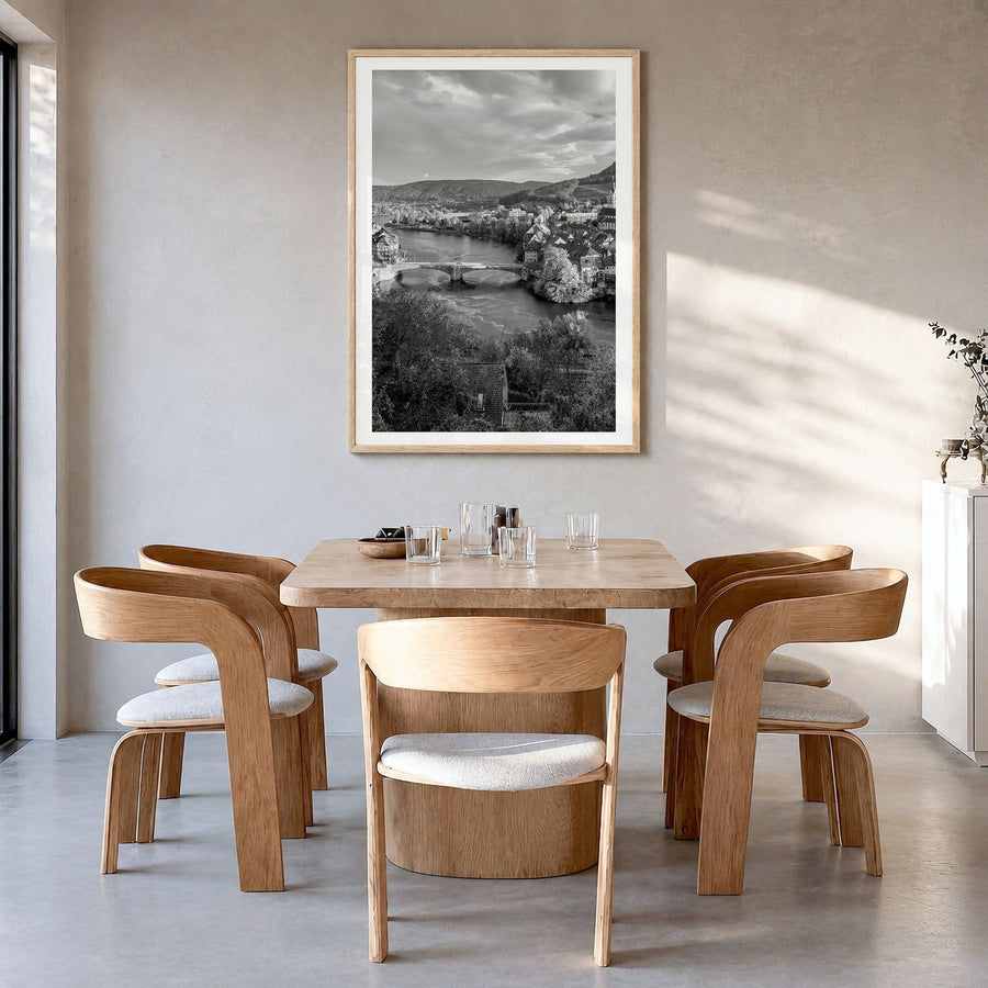 Basel Photo Poster in a natural wood frame, hanging in a dining room, white border