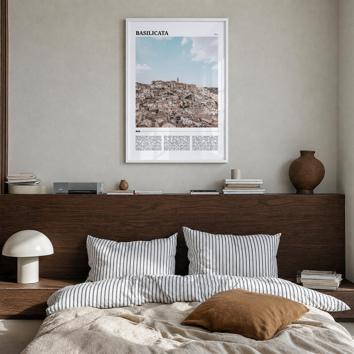Basilicata colorful travel poster of Italy – vertical wall art in white wood frame, hanging on wall