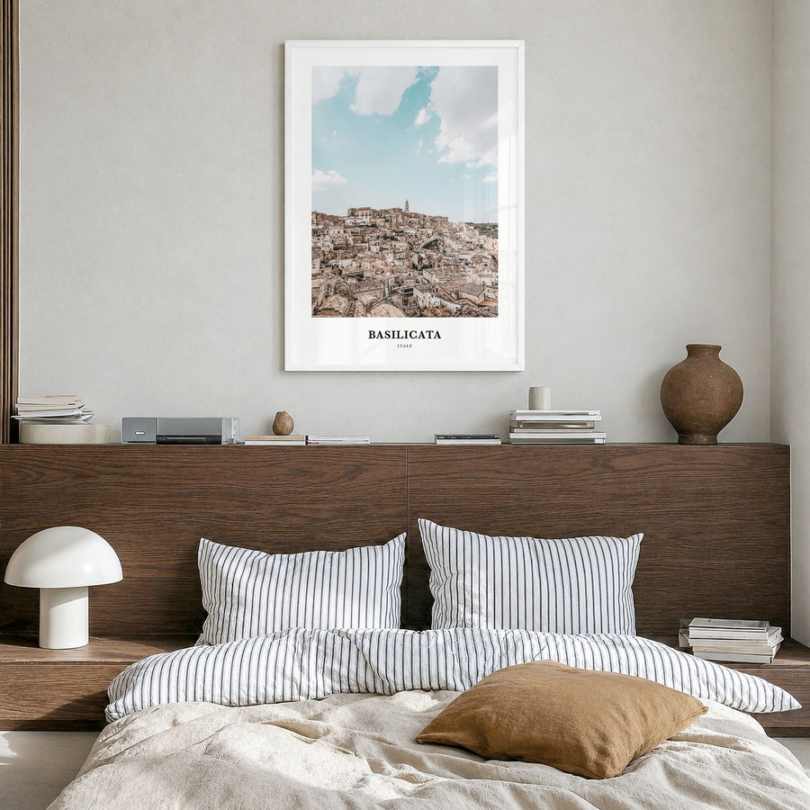 Basilicata Classic Poster in a white wood frame, hanging in a bedroom