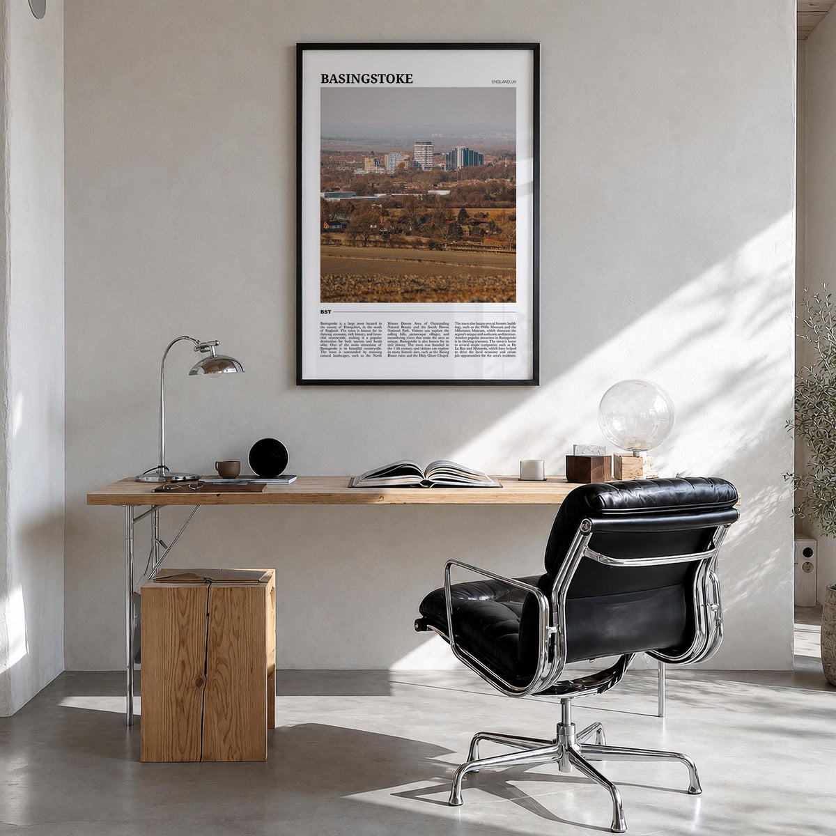 Basingstoke colorful travel poster of United Kingdom – vertical wall art in black wood frame, hanging on wall