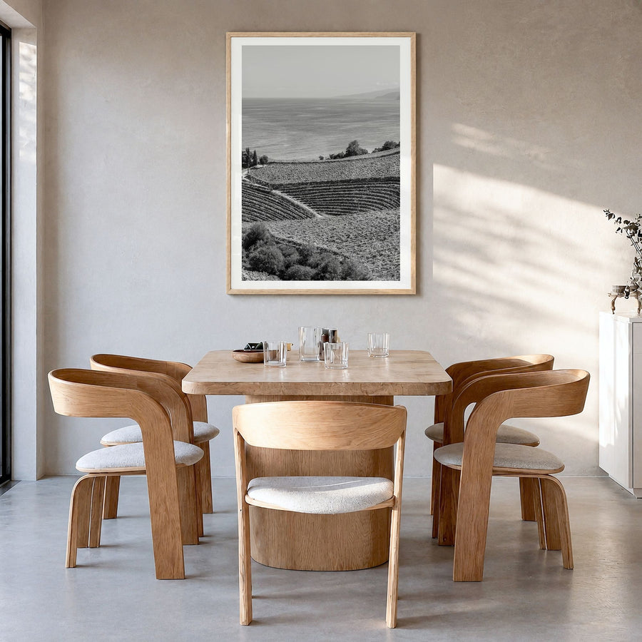 Basque Country Photo Poster in a natural wood frame, hanging in a dining room, white border