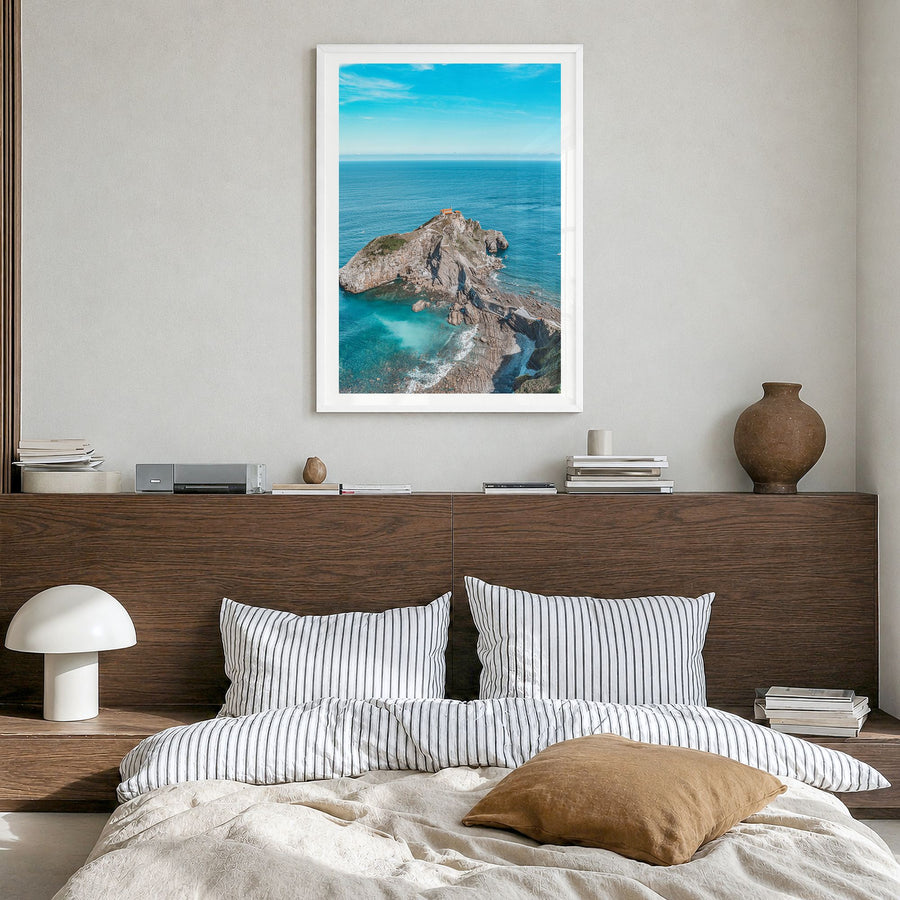 Basque Country Photo Poster in a white wood frame, hanging in a bedroom, white border