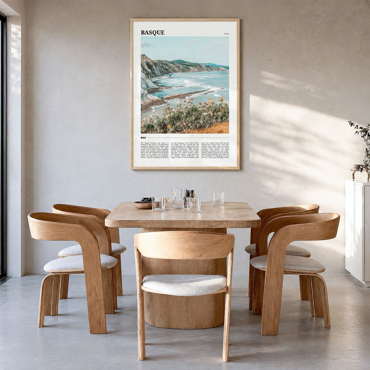 Basque Country Travel No 1 Poster in a natural wood frame, hanging in a dining room