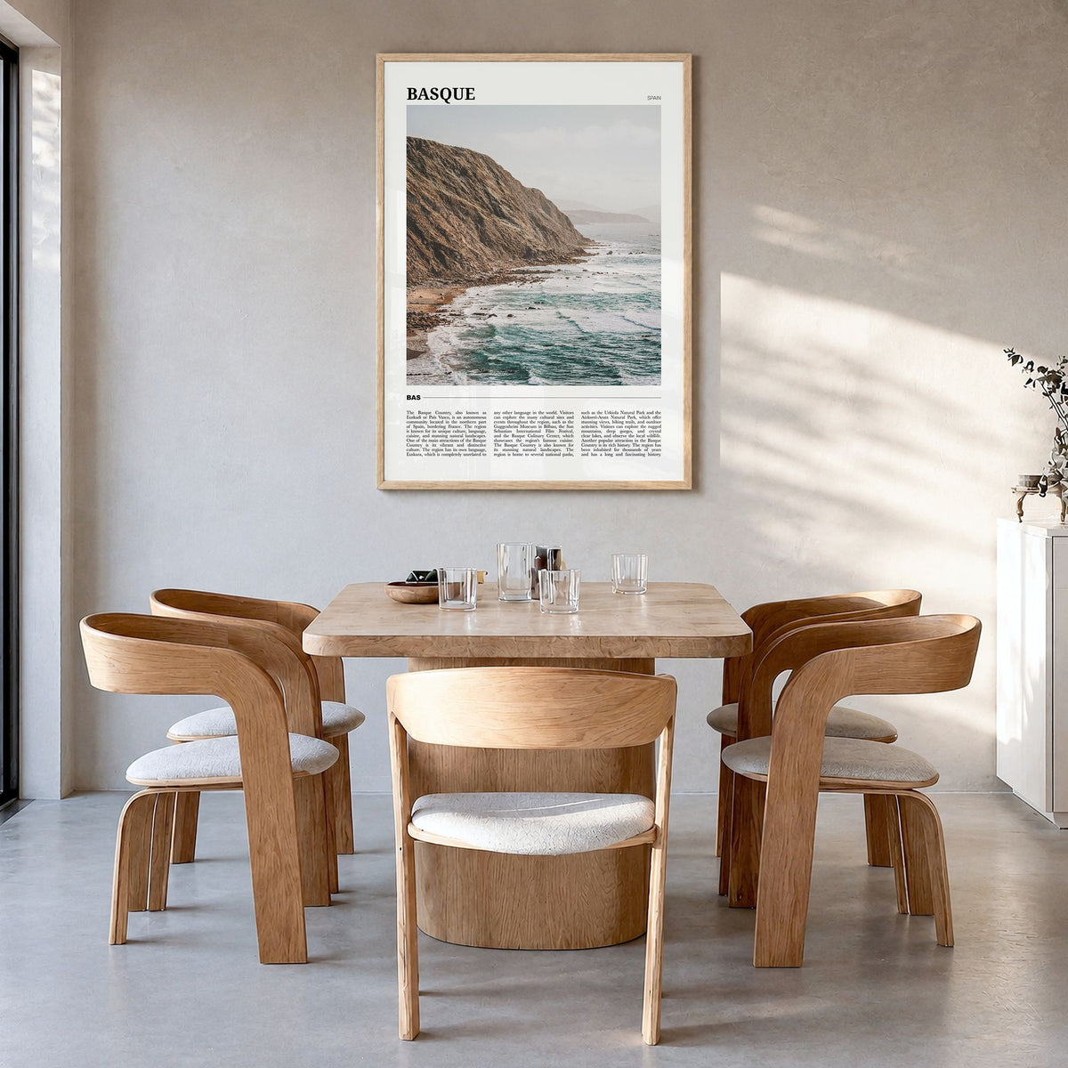 Basque Country Travel No 2 Poster in a natural wood frame, hanging in a dining room