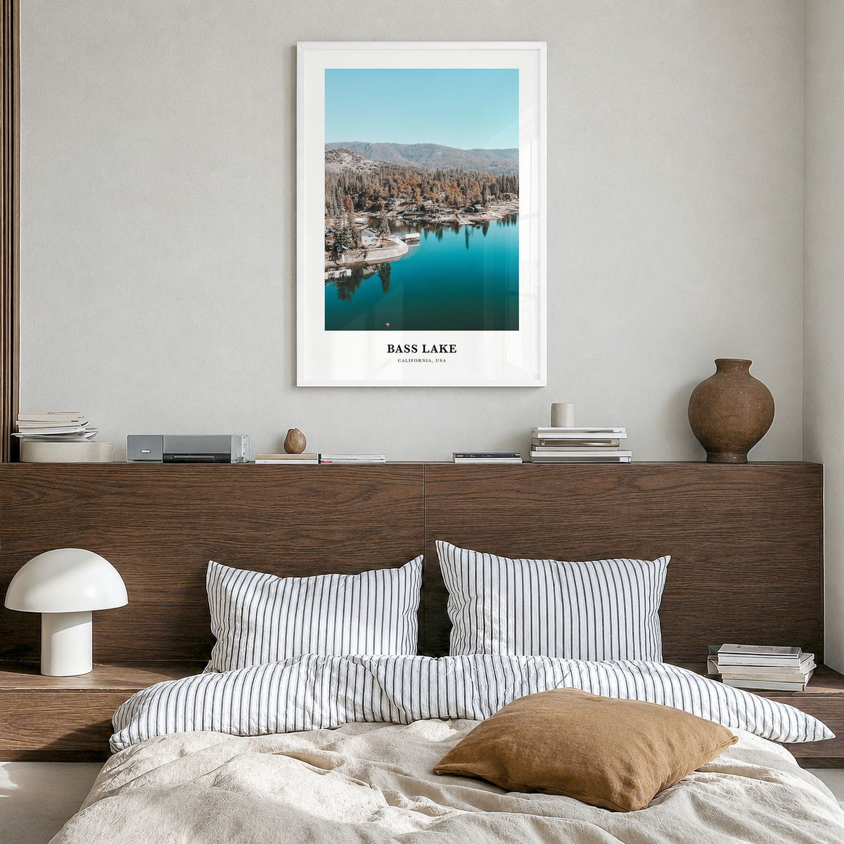 Bass Lake Classic Poster in a white wood frame, hanging in a bedroom