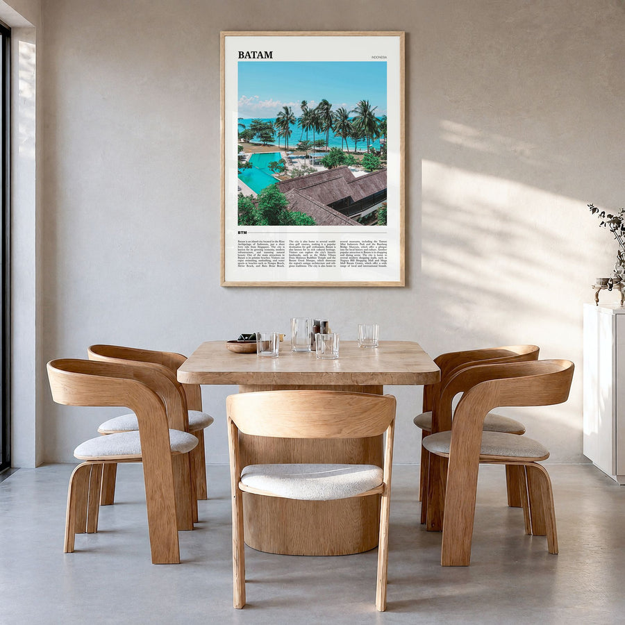 Batam Travel Poster in a natural wood frame, hanging in a dining room