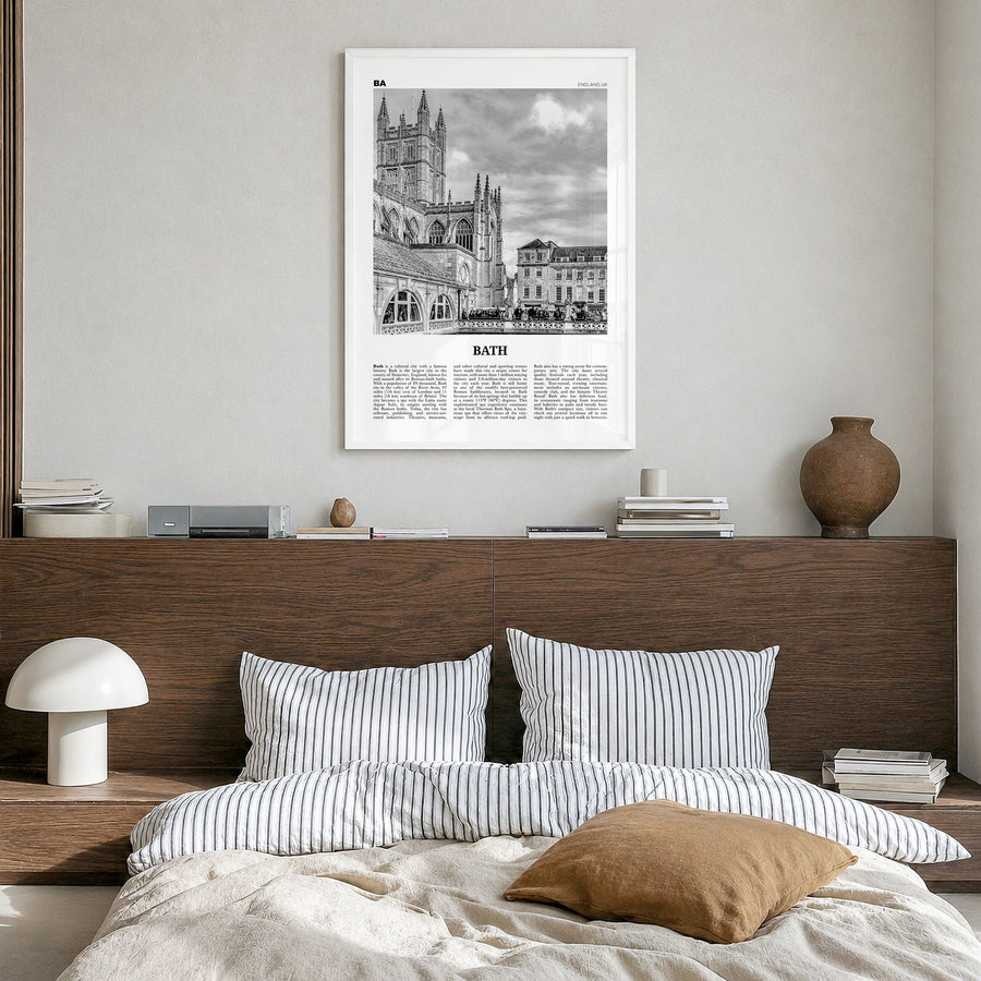 Bath Newspaper Poster in a white wood frame, hanging in a bedroom