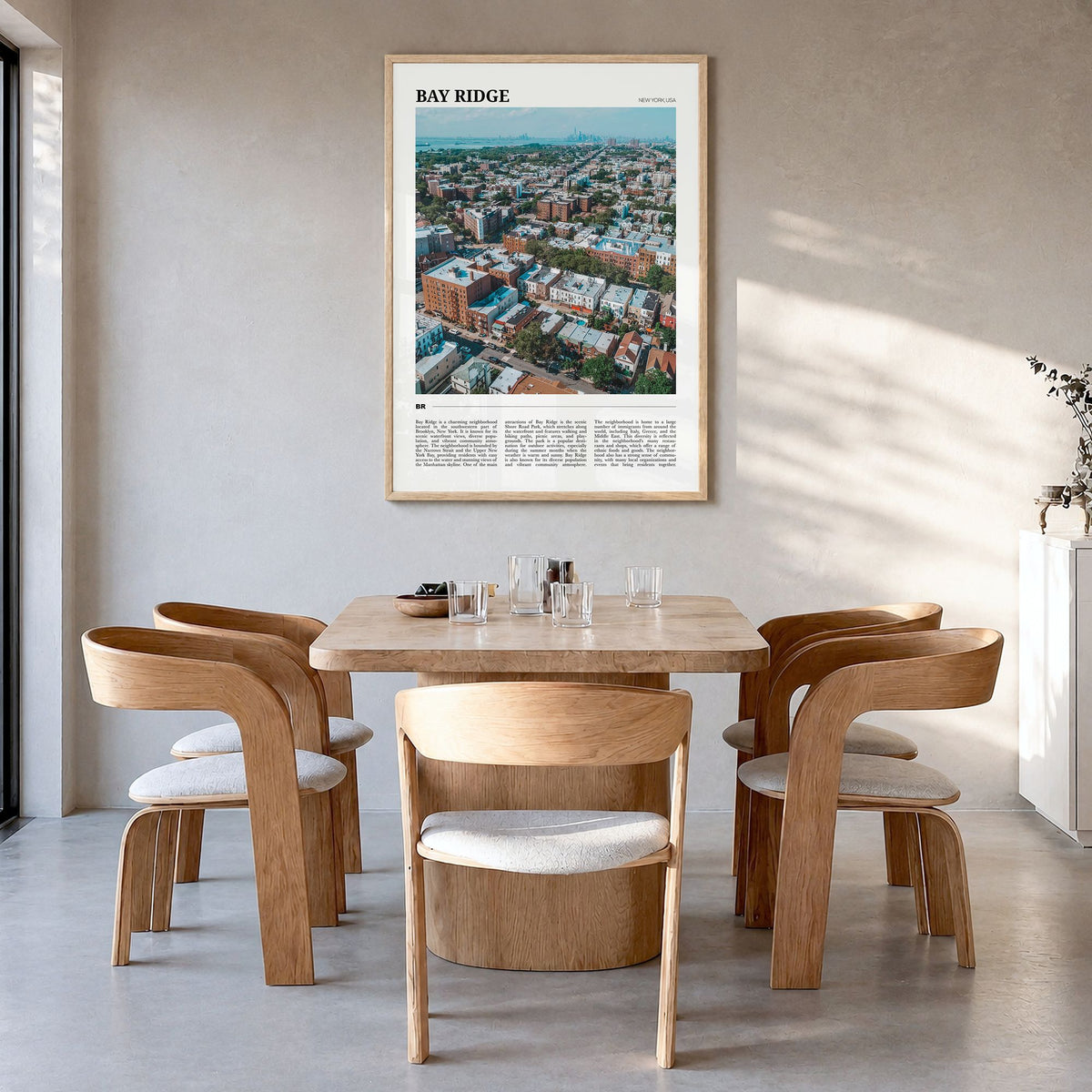 Bay Ridge Travel Poster in a natural wood frame, hanging in a dining room