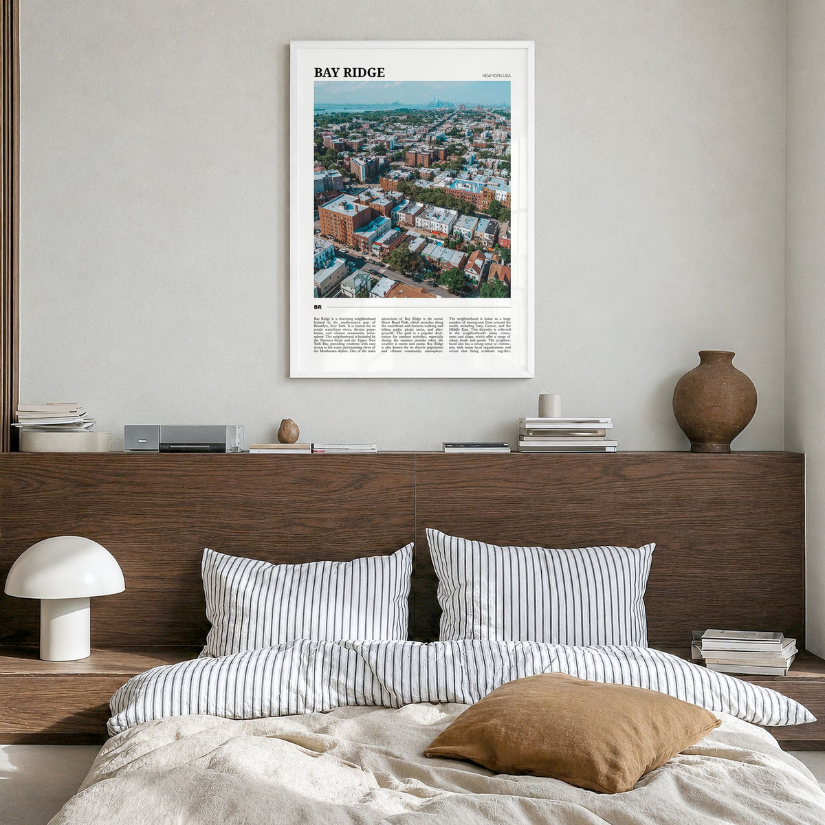 Bay Ridge Travel Poster in a white wood frame, hanging in a bedroom