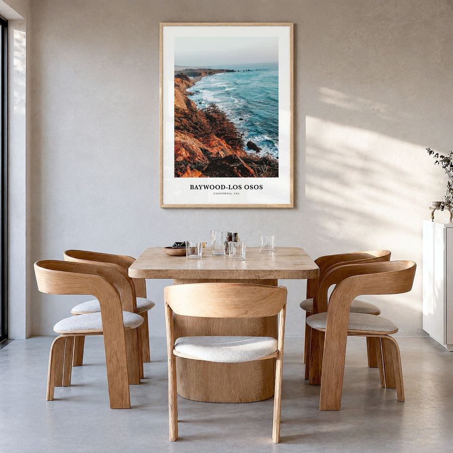 Baywood-Los Osos Classic Poster in a natural wood frame, hanging in a dining room
