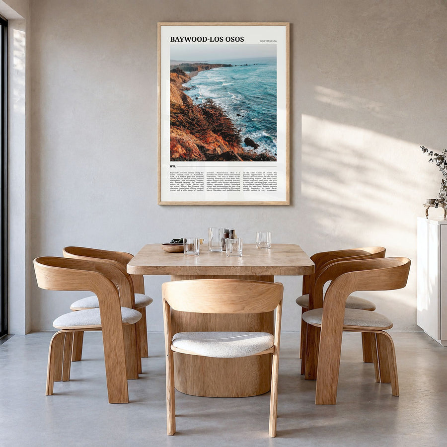Baywood-Los Osos Travel Poster in a natural wood frame, hanging in a dining room