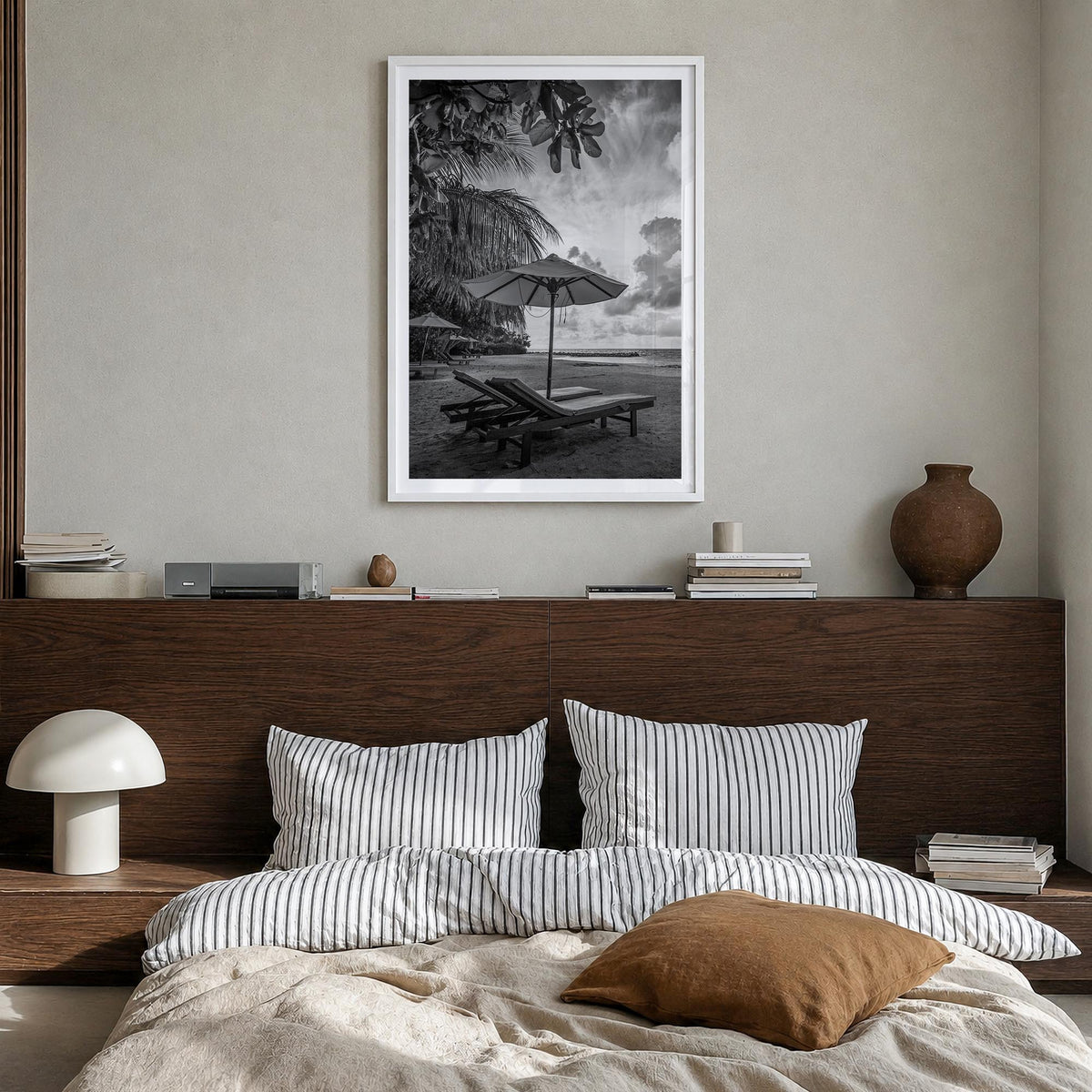 Beach no. 1 black & white photo poster – vertical wall art in white wood frame with white border, hanging on wall