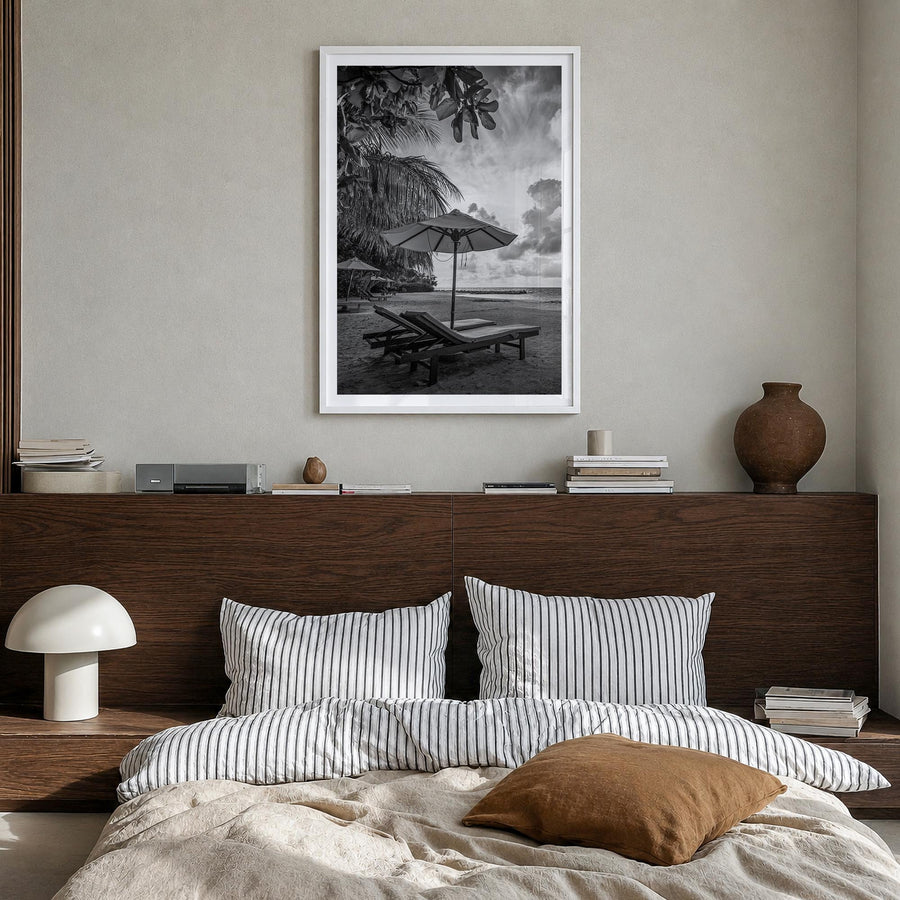Beach no. 1 black & white photo poster – vertical wall art in white wood frame with white border, hanging on wall