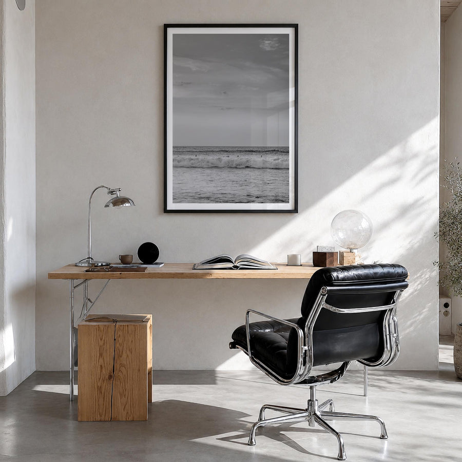 Beach no. 2 black & white photo poster – vertical wall art in black wood frame with white border, hanging on wall