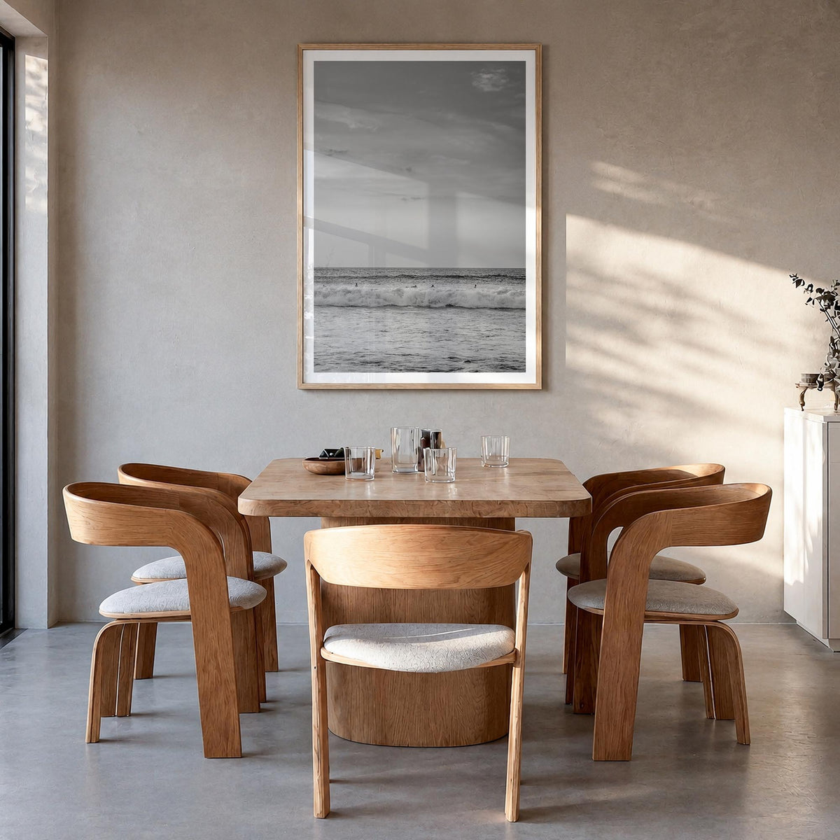 Beach no. 2 black & white photo poster – vertical wall art in natural wood frame with white border, hanging on wall