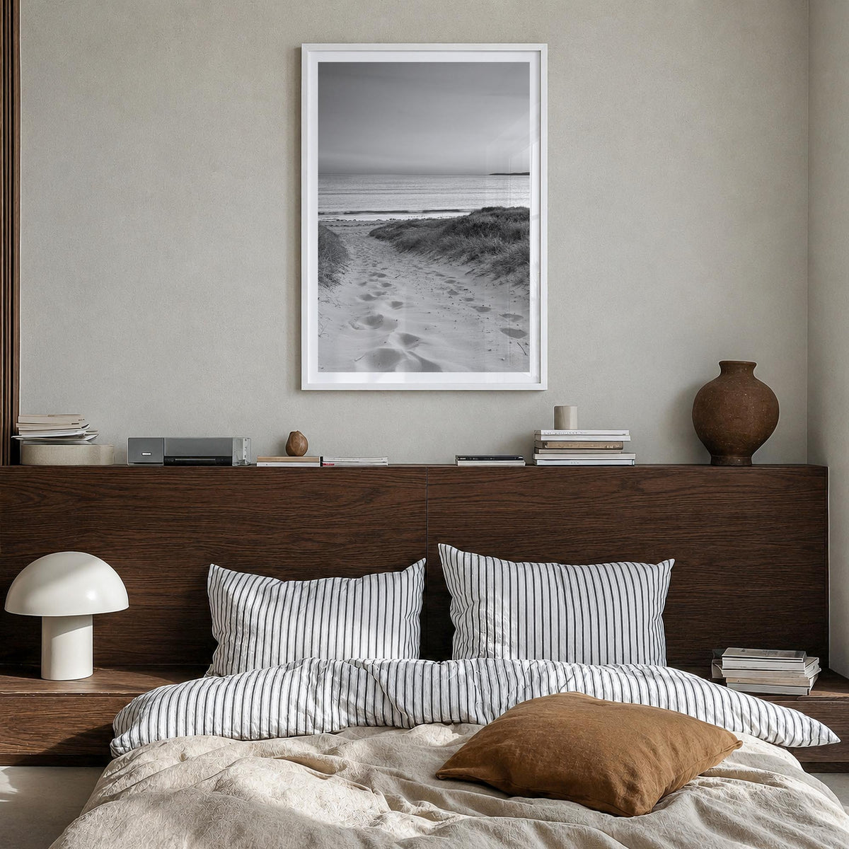Beach Trail no. 1 black & white photo poster – vertical wall art in white wood frame with white border, hanging on wall