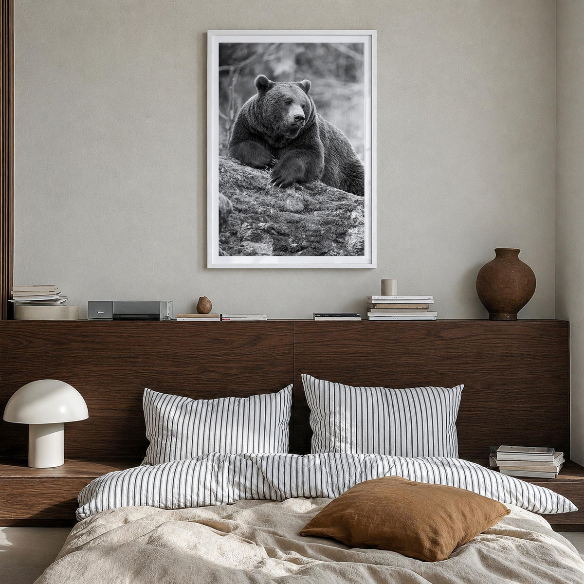 Bear no. 1 black & white photo poster – vertical wall art in white wood frame with white border, hanging on wall