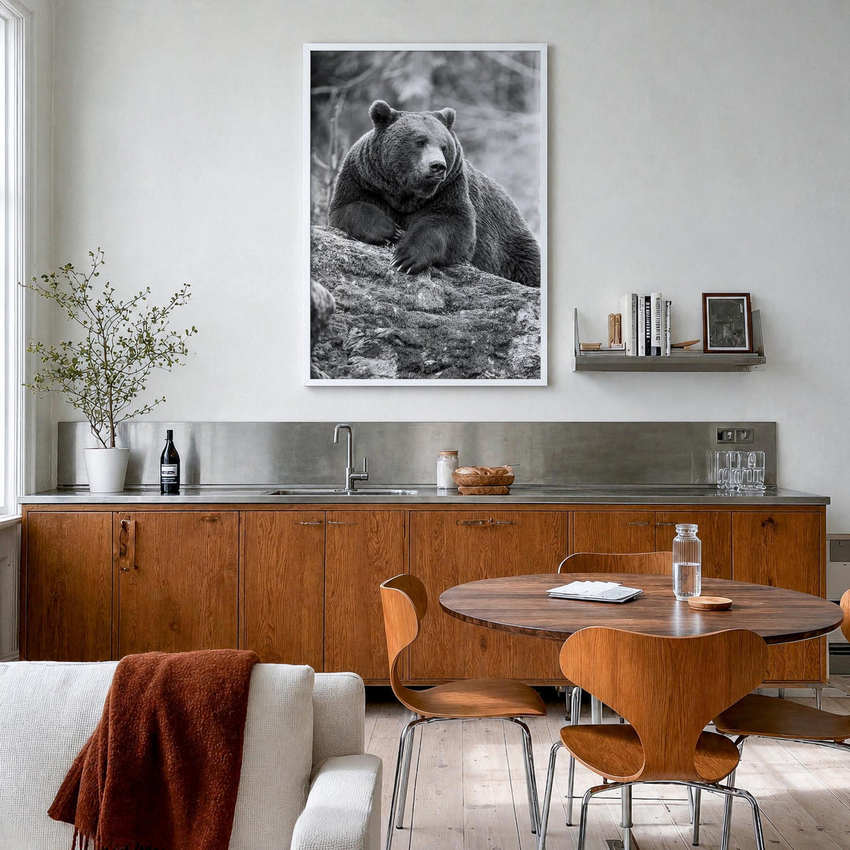 Bear no. 1 black & white photo poster – vertical wall art in white wood frame, hanging on wall